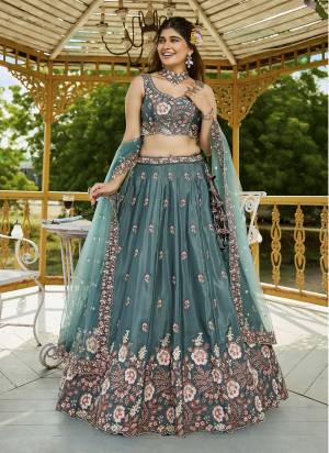 Attrective Looking This Party Wear Fine Color Fancy Heavy Designer Choli And Lahenga Fabriced On Satin And Dupatta Net In Fabricated Beautified With Attrective Designer Heavy Sequance,Multy Thread Embroidery Work. Buy Now.