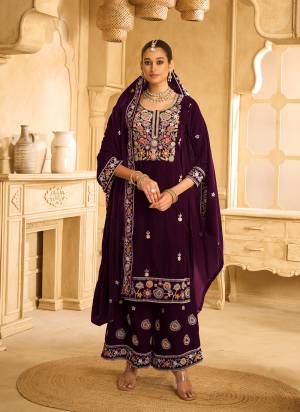 Looking These Party Wear Designer Plazzo Suits in Fine Colored Pair With Dupatta.These Top Are Velvet And Dupatta Are Fabricated On Velvet Pair With Velvet Bottom.Its Beautified With Designer Embroidery Work.