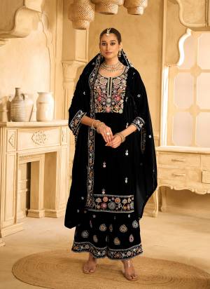 Looking These Party Wear Designer Plazzo Suits in Fine Colored Pair With Dupatta.These Top Are Velvet And Dupatta Are Fabricated On Velvet Pair With Velvet Bottom.Its Beautified With Designer Embroidery Work.
