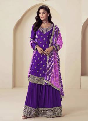 Looking These Party Wear Plazzo Suit in Fine Colored Pair With Dupatta.These Top Are Chinon And Dupatta Are Chiffon And Pair With Chinon Bottom.Its Beautified With Designer Embroidery Work With Printed Dupatta.