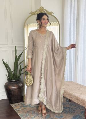 Looking These Suit in Fine Colored Pair With Bottom And Dupatta.These Top And Bottom Are Fabricated On Vichitra Silk Pair With Vichitra Silk Dupatta.Its Beautified With Designer Embroidery Work.