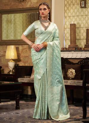 Looking These Party Wear Saree in Fine Colored.These Saree Are Satin Silk And Blouse is Fabricated On Satin Silk.Its Beautified With Weaving Jari Designer.