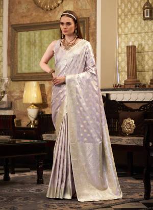 Looking These Party Wear Saree in Fine Colored.These Saree Are Satin Silk And Blouse is Fabricated On Satin Silk.Its Beautified With Weaving Jari Designer.