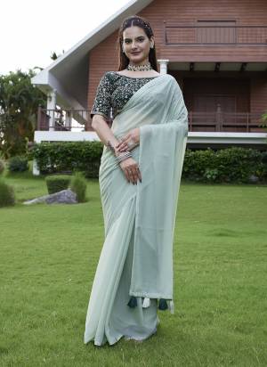 Looking These Party Wear Saree in Fine Colored Pair With Blouse.These Saree Are Georgette and Blouse Are Fabricated On Art Silk.Its Beautified With  Solid  With Embroidery Work Blouse.