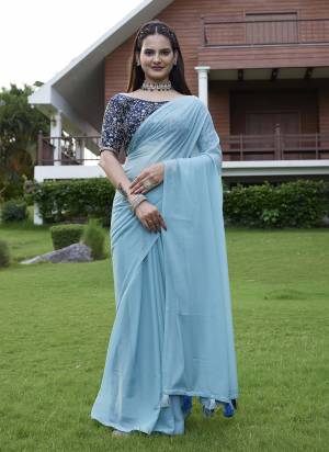 Looking These Party Wear Saree in Fine Colored Pair With Blouse.These Saree Are Georgette and Blouse Are Fabricated On Art Silk.Its Beautified With  Solid  With Embroidery Work Blouse.