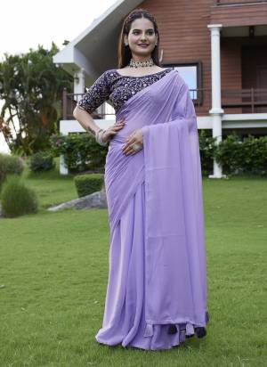 Looking These Party Wear Saree in Fine Colored Pair With Blouse.These Saree Are Georgette and Blouse Are Fabricated On Art Silk.Its Beautified With  Solid  With Embroidery Work Blouse.