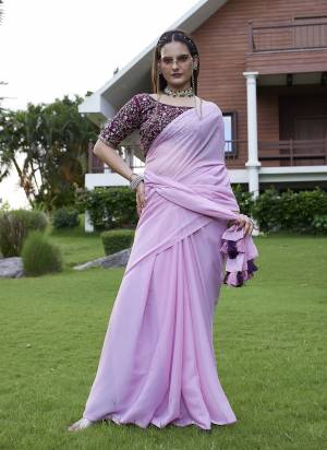 Looking These Party Wear Saree in Fine Colored Pair With Blouse.These Saree Are Georgette and Blouse Are Fabricated On Art Silk.Its Beautified With  Solid  With Embroidery Work Blouse.