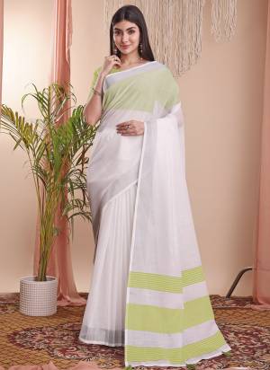 Looking These Fastive Wear Saree in Fine Colored.These Saree And Blouse is Fabricated On Linen Cotton.Its Beautified With Weavon Designer.
