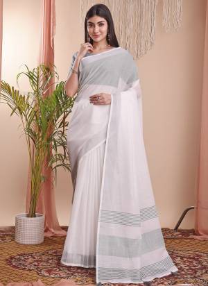 Looking These Fastive Wear Saree in Fine Colored.These Saree And Blouse is Fabricated On Linen Cotton.Its Beautified With Weavon Designer.