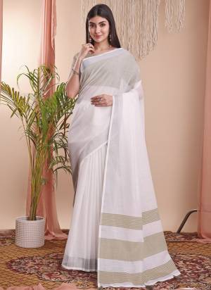 Looking These Fastive Wear Saree in Fine Colored.These Saree And Blouse is Fabricated On Linen Cotton.Its Beautified With Weavon Designer.