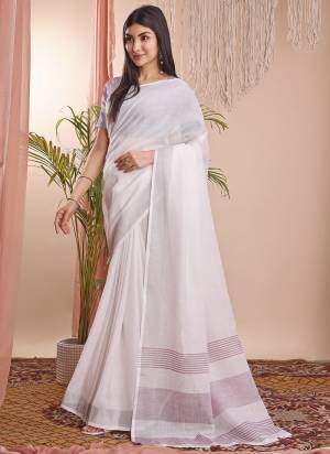 Looking These Fastive Wear Saree in Fine Colored.These Saree And Blouse is Fabricated On Linen Cotton.Its Beautified With Weavon Designer.