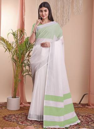 Looking These Fastive Wear Saree in Fine Colored.These Saree And Blouse is Fabricated On Linen Cotton.Its Beautified With Weavon Designer.