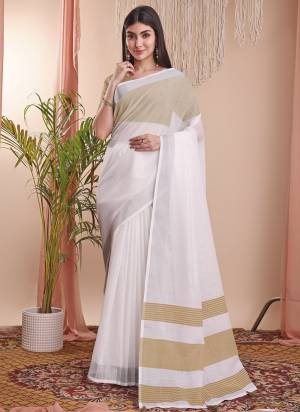 Looking These Fastive Wear Saree in Fine Colored.These Saree And Blouse is Fabricated On Linen Cotton.Its Beautified With Weavon Designer.