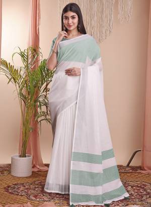 Looking These Fastive Wear Saree in Fine Colored.These Saree And Blouse is Fabricated On Linen Cotton.Its Beautified With Weavon Designer.
