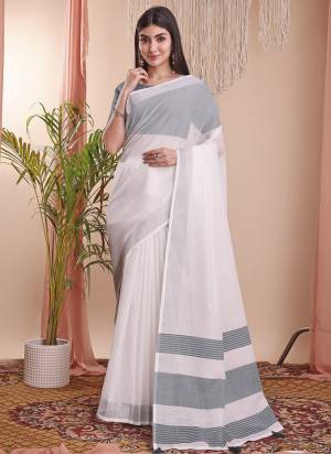 Looking These Fastive Wear Saree in Fine Colored.These Saree And Blouse is Fabricated On Linen Cotton.Its Beautified With Weavon Designer.