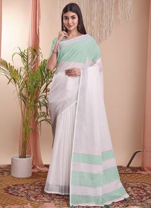 Looking These Fastive Wear Saree in Fine Colored.These Saree And Blouse is Fabricated On Linen Cotton.Its Beautified With Weavon Designer.