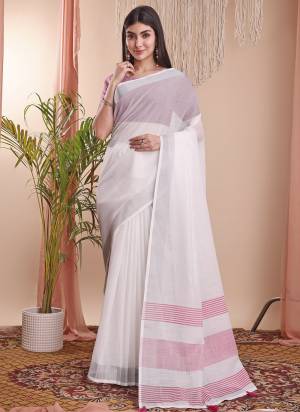 Looking These Fastive Wear Saree in Fine Colored.These Saree And Blouse is Fabricated On Linen Cotton.Its Beautified With Weavon Designer.