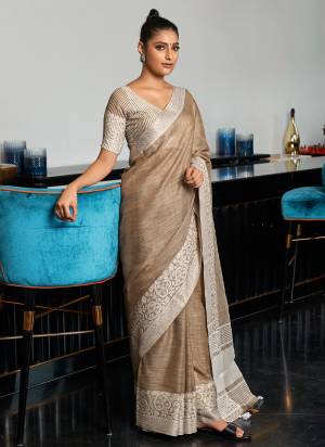 Looking These Party Wear Saree in Fine Colored.These Saree And Blouse is Fabricated On linen.Its Beautified With Weavon Designer.