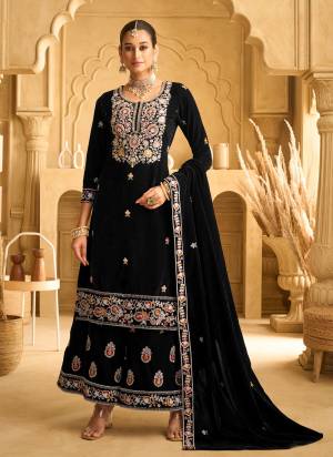 Looking These Party Wear Designer Plazzo Suits in Fine Colored Pair With Dupatta.These Top Are Velvet And Dupatta Are Fabricated On Velvet Pair With Velvet Bottom.Its Beautified With Designer Embroidery Work.