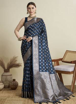 Garb This Party Wear Saree Paired With Blouse.This Saree And Blouse Are Satin Silk Fabric With Wevon Jari Designer. Buy This Pretty Saree Now.