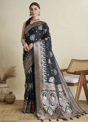 Looking This Party Wear Two Tone Saree Paired With Blouse.This Saree And Blouse Are Satin Silk Fabric With Wevon Jari Designer. Buy This Pretty Saree Now.