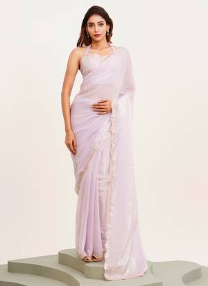 Garb These Fancy Party Wear Saree in Fine Colored.These Saree Are Tissue And Blouse is Fabricated On Art Silk Pair.Its Beautified With Fancy Sequinned Work Disigner Saree.