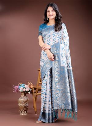 Looking These Party Wear Saree in Fine Colored.These Saree And Blouse is Fabricated On Linen Cotton.Its Beautified With Weavon Jacquatd Designer.