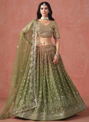 For A Designer Look,Grab These Party Wear Lehenga Choli in Fine Colored.These Lehenga And Blouse Are Fabricated On Georgette Pair With Dupatta Are Soft Net.Its Beautified With Pedding Color,Designer Jari,Sequance Embroidery Work.