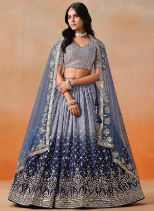 For A Designer Look,Grab These Party Wear Lehenga Choli in Fine Colored.These Lehenga And Blouse Are Fabricated On Georgette Pair With Dupatta Are Soft Net.Its Beautified With Pedding Color,Designer Jari,Sequance Embroidery Work.