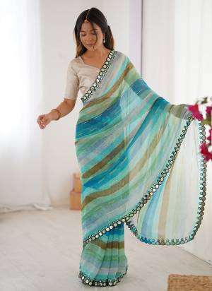 Attractive These Party Wear Saree in Fine Colored.These Saree Are Chiffon And Blouse is Jari Brocade Fabricated.Its Beautified With Designer Lariya Printed With Mirror Cut Work.