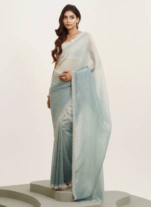 Garb These Fancy Party Wear Saree in Fine Colored.These Saree Are Tissue And Blouse is Fabricated On Art Silk Pair.Its Beautified With Fancy Beads And Stone Work Disigner Saree.