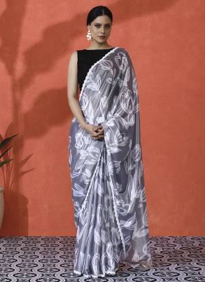 Looking These Party Wear Saree in Fine Colored.These Saree is Fabricated On Chinon Pair With Chinon Blouse.Its Beautified Designer Digital Printed.