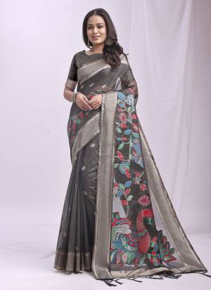 Garb These Fastive Wear Saree in Fine Colored.These Saree And Blouse is Fabricated On Linen Cotton.Its Beautified With Weavon Jacquard Designer.