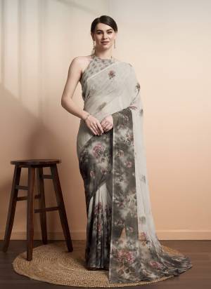 Attrective These Party Wear Saree in Fine Colored.These Saree And Blouse is Fabricated On Georgette.Its Beautified With Designer Printed.