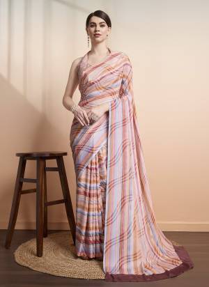 Attrective These Party Wear Saree in Fine Colored.These Saree And Blouse is Fabricated On Georgette.Its Beautified With Designer Printed.