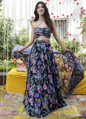 For A Fancy Designer Look,Grab These Lehenga Choli With Dupatta in Fine Colored.These Lehenga And Choli Are Faux Georgette And Dupatta Are Fabricated On Faux Georgette Pair.Its Beautified With Designer Digital Printed.