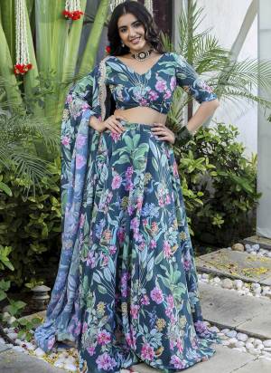 For A Fancy Designer Look,Grab These Lehenga Choli With Dupatta in Fine Colored.These Lehenga And Choli Are Faux Georgette And Dupatta Are Fabricated On Faux Georgette Pair.Its Beautified With Designer Digital Printed.