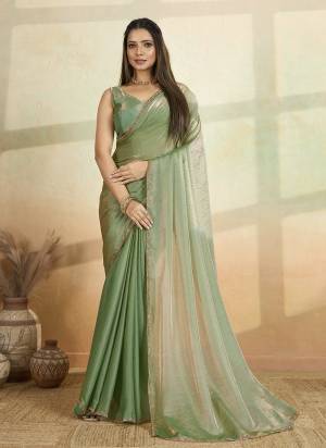 Attrective These Party Wear Saree in Fine Colored.These Saree Are Frendy Satin And Blouse is Frendy Satin Fabricated.Its Beautified With Designer Beads Embroidery Work Lace Border.