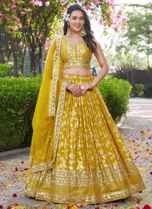 For A Designer Look,Grab These Lehenga Choli in Fine Colored.These Lehenga And Blouse Are Fabricated On Dola Silk Pair With Dupatta Are Organza.Its Beautified With Wevon Jacquard Designer,Jari, Sequance Embroidery Work.