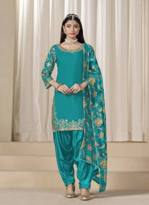Looking These Beautiful Party Wear Fine Color Salwar Suits.These Top Are Roman Silk And Dupatta Are Chanderi Silk And Bottom Santoon Fabricated.Its Beautified With Designer Embroidery Work With Printed Dupatta.