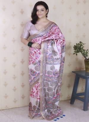 Looking These Party Wear Saree in Fine Colored.These Saree And Blouse is Fabricated On Tussar Silk.Its Beautified With Weaving Jari Border Designer With Madhubani Digital Printed.