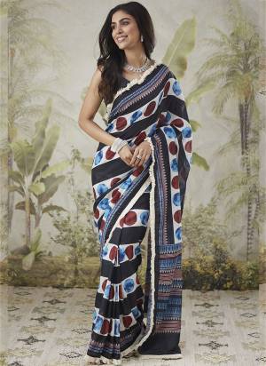Garb These Party Wear Ready To Wear Saree in Fine Colored.These Saree Are Muslin And Blouse is Muslin Fabricated.Its Beautified With Designer Printed With Lace Border.