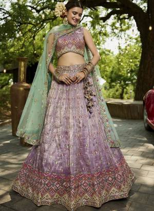 Attrective Looking This Party Wear Fine Color Fancy Heavy Designer Choli And Lahenga Fabriced On Tissue And Dupatta Net In Fabricated Beautified With Attrective Designer Heavy Sequance,Multy Thread Embroidery Work. Buy Now.