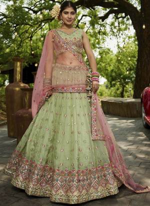 Attrective Looking This Party Wear Fine Color Fancy Heavy Designer Choli And Lahenga Fabriced On Tissue And Dupatta Net In Fabricated Beautified With Attrective Designer Heavy Sequance,Multy Thread Embroidery Work. Buy Now.
