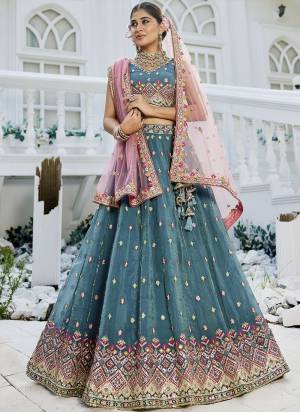 Attrective Looking This Party Wear Fine Color Fancy Heavy Designer Choli And Lahenga Fabriced On Tissue And Dupatta Net In Fabricated Beautified With Attrective Designer Heavy Sequance,Multy Thread Embroidery Work. Buy Now.