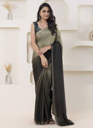 Looking These Party Wear Ready To Wear Saree in Fine Colored.These Saree Are Satin And Blouse is Satin Fabricated.Its Beautified With Pedding Color Designer With Swarovski Border And Printed Blouse.