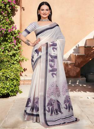 Look These Fastive Saree in Fine Colored.These Saree Are Linen Cotton And Blouse is Fabricated On Linen Cotton Pair.Its Beautified With Wevon Jari Border With Designer Digital Printed.