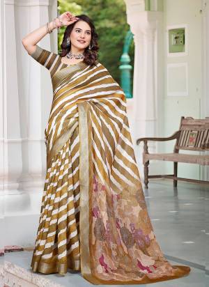 Attrective These Fastive Saree in Fine Colored.These Saree Are Linen Cotton And Blouse is Fabricated On Linen Cotton Pair.Its Beautified With Wevon Jari Border With Designer Digital Printed.