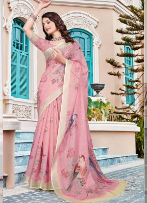 Attrective These Fastive Saree in Fine Colored.These Saree Are Linen Cotton And Blouse is Fabricated On Linen Cotton Pair.Its Beautified With Wevon Jari Border With Designer Digital Printed.