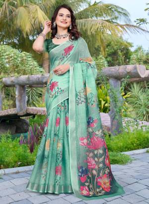 Attrective These Fastive Saree in Fine Colored.These Saree Are Linen Cotton And Blouse is Fabricated On Linen Cotton Pair.Its Beautified With Wevon Jari Border With Designer Digital Printed.